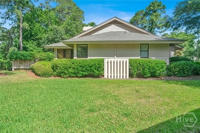 This exceptionally updated, one-level end unit on the lagoon is - photo 5