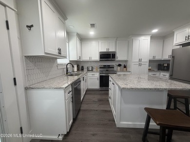 Completely remodeled inside and out, this waterfront coastal - photo 5