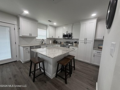 Completely remodeled inside and out, this waterfront coastal - photo 7