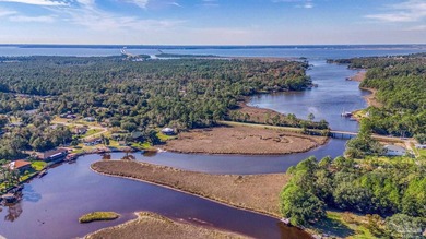 Nestled on nearly half an acre of serene waterfront property - photo 8