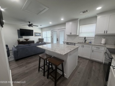 Completely remodeled inside and out, this waterfront coastal - photo 9