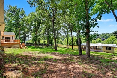Charming 3 bedroom 2 bath home nestled on the banks of beautiful - photo 5
