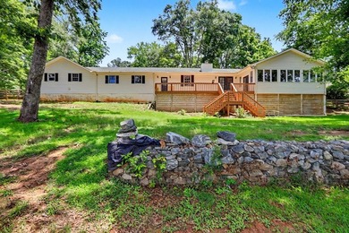 Charming 3 bedroom 2 bath home nestled on the banks of beautiful - photo 6
