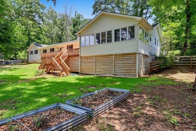 Charming 3 bedroom 2 bath home nestled on the banks of beautiful - photo 9