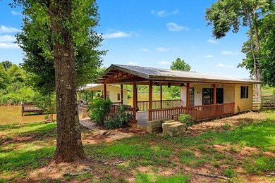 Charming 3 bedroom 2 bath home nestled on the banks of beautiful - photo 10