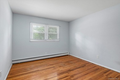 Nestled on a quiet half-acre lot in one of Stony Brook's most - photo 13