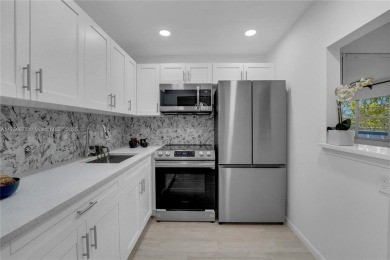 Lake Condo For Sale in Deerfield Beach, Florida
