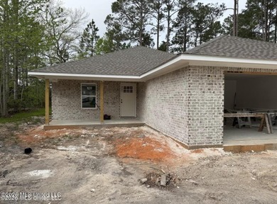 This beautiful brand new home offers an open floor plan with LVP - photo 1
