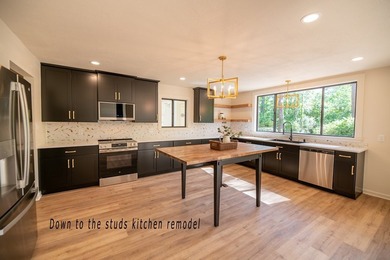 Discover this beautifully updated contemporary home, now - photo 12