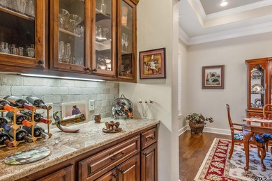 Custom-built and meticulously maintained, this beautiful