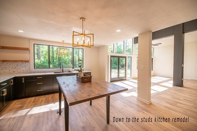 Discover this beautifully updated contemporary home, now - photo 13