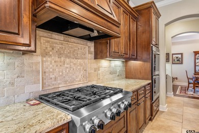 Custom-built and meticulously maintained, this beautiful