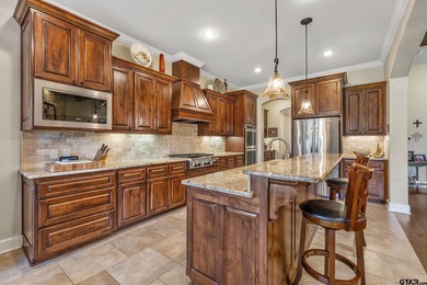 Custom-built and meticulously maintained, this beautiful