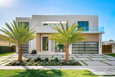 Now complete and move-in ready, 750 NE 69th Street is a striking - photo 2
