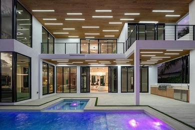 Now complete and move-in ready, 750 NE 69th Street is a striking - photo 6