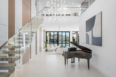 Now complete and move-in ready, 750 NE 69th Street is a striking - photo 8