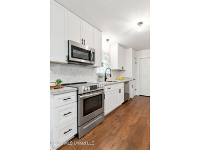 Welcome to this beautifully remodeled home, in a quiet - photo 7