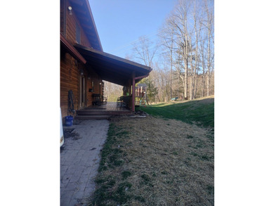 INCREDIBLE CONTEMPORARY LOG HOME. BOASTS 5 BEDROOMS AND 2.5 - photo 3