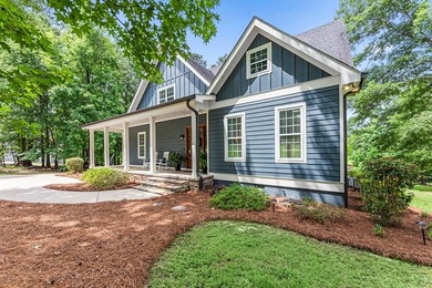 Welcome to 484 Eagles Way, in the gated Eagles Point - photo 3