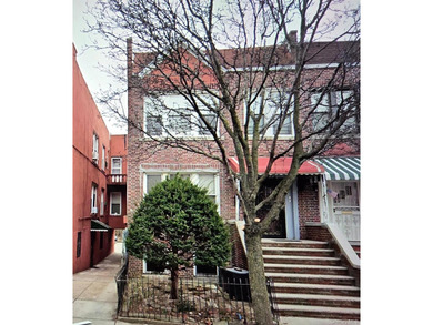 Welcome to an excellent two-family brick home in the heart of - photo 1
