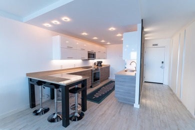 Beautifully remodeled 2-bedroom, 2-bath residence located in the - photo 5