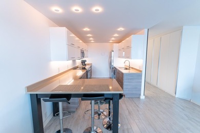 Beautifully remodeled 2-bedroom, 2-bath residence located in the - photo 6