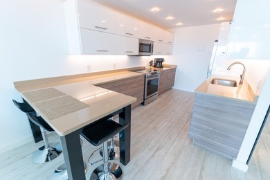 Beautifully remodeled 2-bedroom, 2-bath residence located in the - photo 7