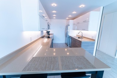 Beautifully remodeled 2-bedroom, 2-bath residence located in the - photo 9