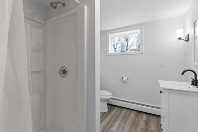 Welcome to 472 Dunn Road in Belgrade, a beautifully renovated - photo 38