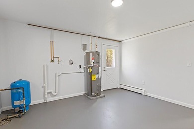 Welcome to 472 Dunn Road in Belgrade, a beautifully renovated - photo 42