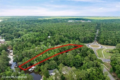 WATERFRONT - Build your dream home on this nearly 1.34 of an - photo 10