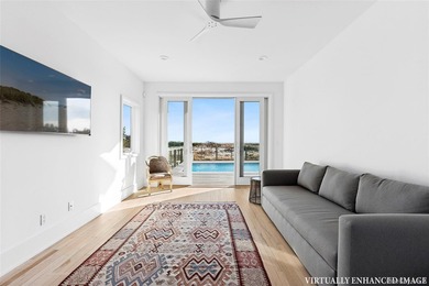 Set along coveted Dune Road, this jetty-protected oceanfront - photo 11