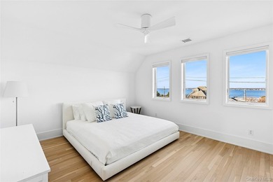 Set along coveted Dune Road, this jetty-protected oceanfront - photo 17