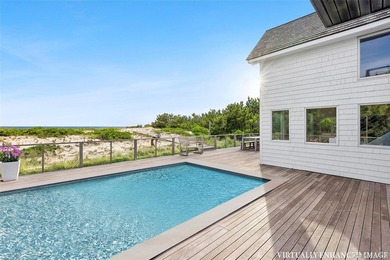 Set along coveted Dune Road, this jetty-protected oceanfront - photo 19