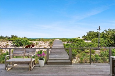 Set along coveted Dune Road, this jetty-protected oceanfront - photo 20