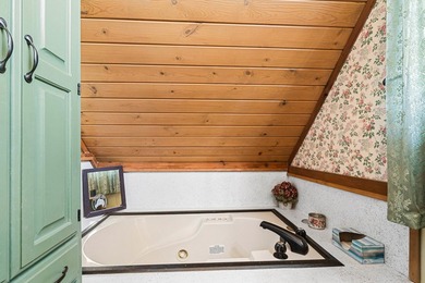 Escape to your own private retreat with this stunning log home - photo 33