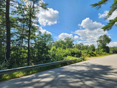 Beautiful building lot with over 200ft on the Soucook River! - photo 10