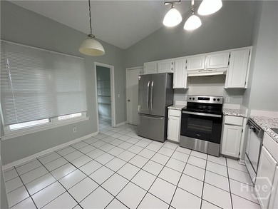 Well kept island bungalow. LVP through out (no carpet) and fresh - photo 5
