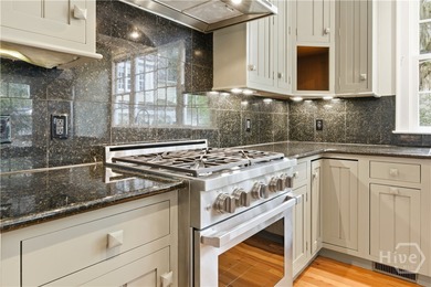 Nestled within the prestigious Ford Field and River Club, this - photo 11