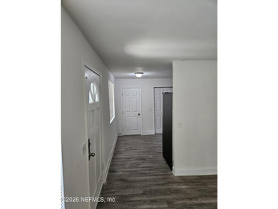 Move-in-ready 4-bedroom, 2-bath home featuring a new roof, new - photo 3