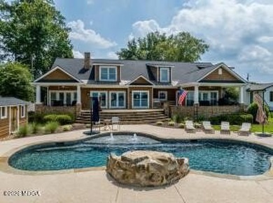 Welcome to 245 Lakeshore Circle, a stunning lakefront retreat - photo 1