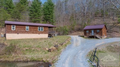 This is a 2 bedroom 1 full bath cabin with natural gas heat pump - photo 1