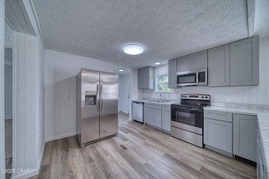 This beautifully renovated 3-bedroom, 2-bathroom home is packed - photo 22
