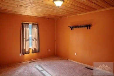 This is a 2 bedroom 1 full bath cabin with natural gas heat pump - photo 6