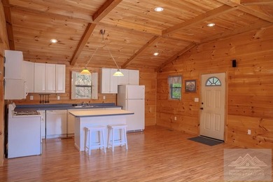 This is a 2 bedroom 1 full bath cabin with natural gas heat pump - photo 8