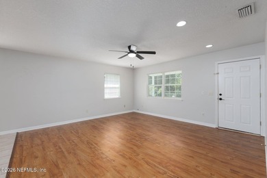 This charming cottage-style home with 3 beds + 2 baths is - photo 5
