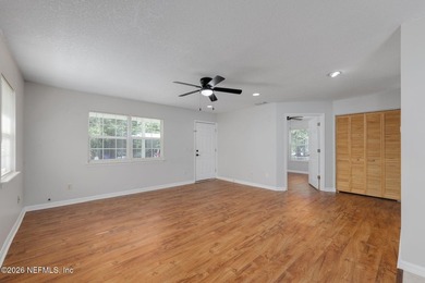 This charming cottage-style home with 3 beds + 2 baths is - photo 7