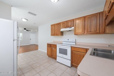 This charming cottage-style home with 3 beds + 2 baths is - photo 9