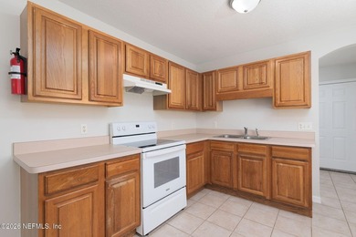 This charming cottage-style home with 3 beds + 2 baths is - photo 10