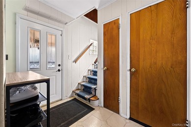 Welcome home to this inviting brick semi-attached single-family - photo 3